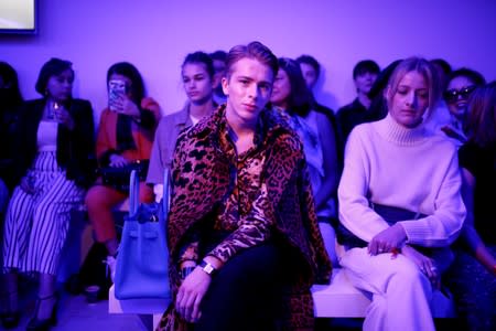 Fashion student John Currie attends the Alexa Chung public catwalk show during London Fashion Week in London