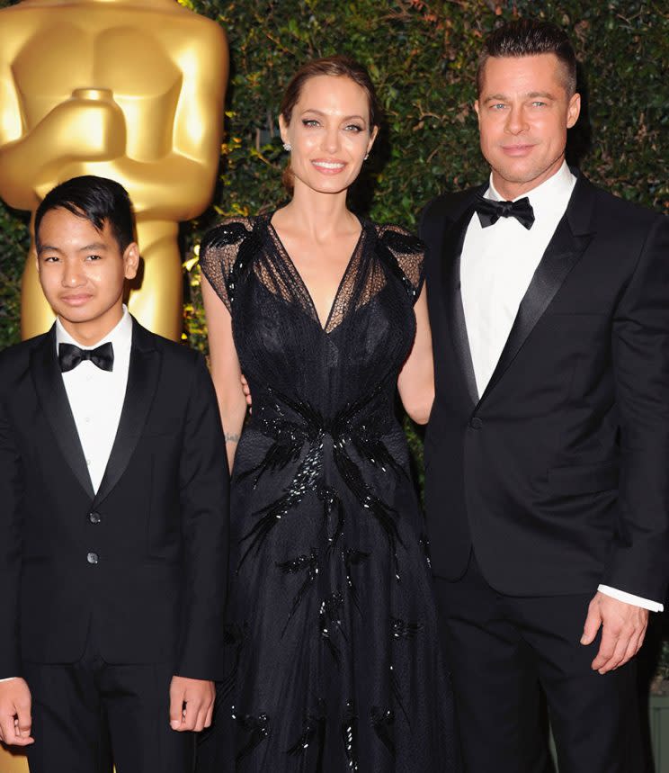 Brad Pitt, Angelina Jolie, and son Maddox Jolie-Pitt in 2013. (Photo: Jon Kopaloff/FilmMagic)