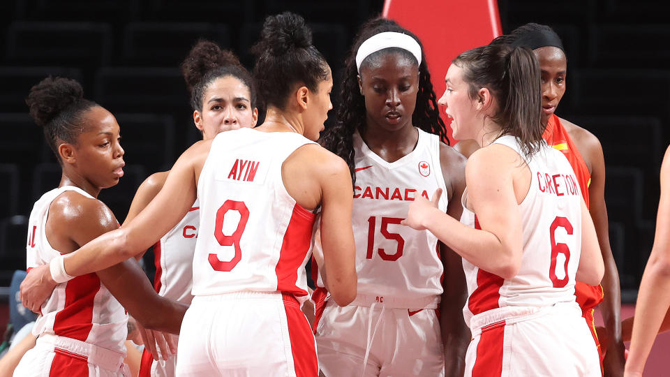 Members of Team Canada huddle during the second half of a Women's Basketball Preliminary Round Group A game against Spain at Saitama Super Arena on August 01, 2021 in Saitama, Japan. (Photo by Gregory Shamus/Getty Images)