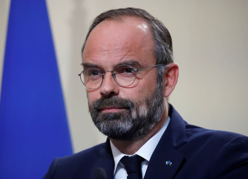 French Prime Minister Edouard Philippe attends a news conference on immigration at the Hotel Matignon in Paris