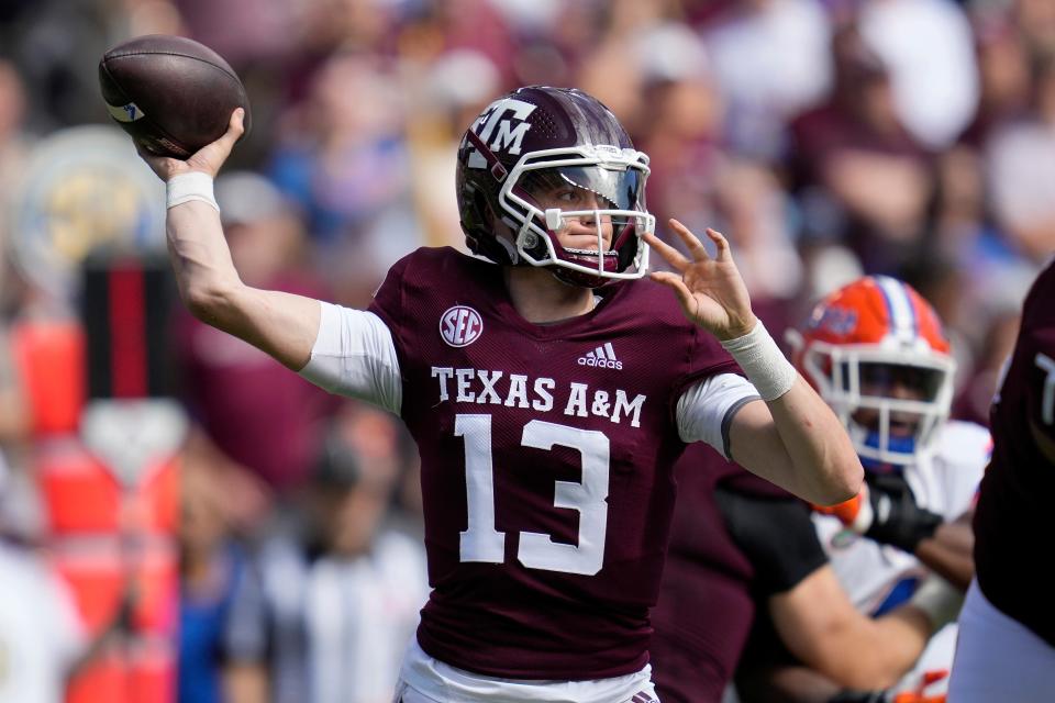 Then-Texas A&M quarterback Haynes King (13), who now plays for the Georgia Tech Yellow Jackets, throws downfield against Florida during the second half of an NCAA college football game Saturday, Nov. 5, 2022, in College Station, Texas.
