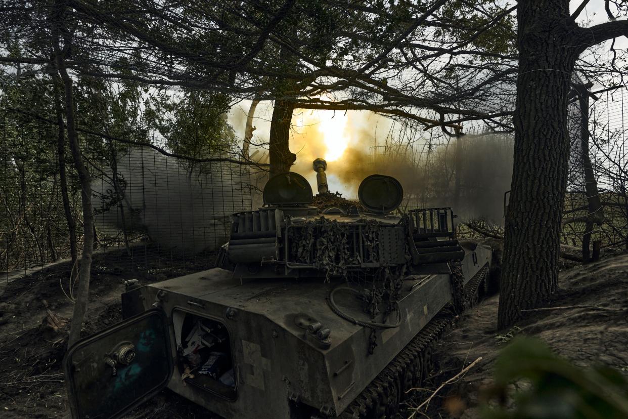 A Ukrainian self-propelled artillery system fires towards the Russian positions at the frontline in Donetsk (AP)