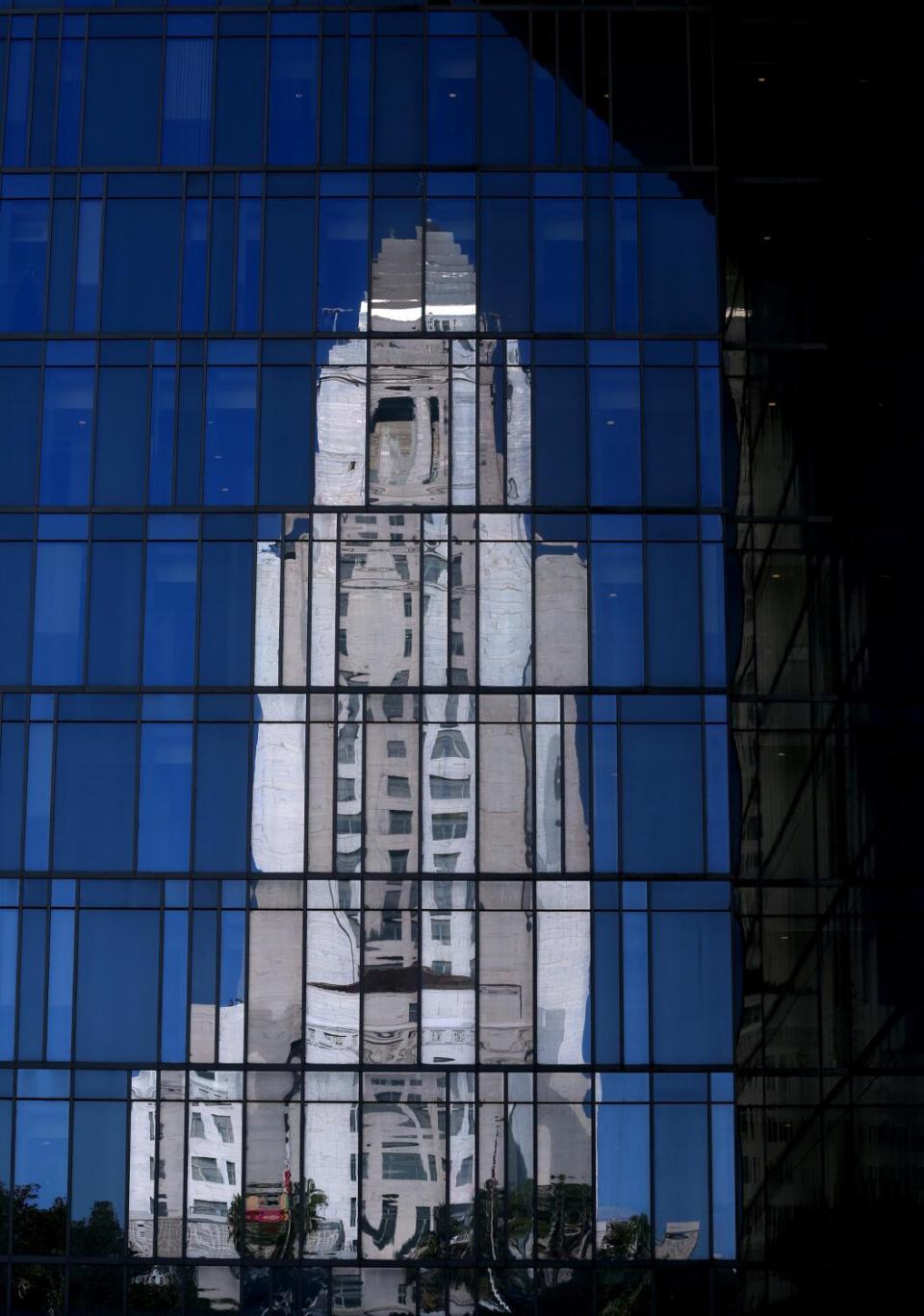 City Hall makes a cubist reflection in the windows of the LAPD Headquarters in downtown Los Angeles.