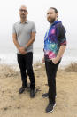 Author Neil Strauss, left, and Incubus guitarist Mike Einziger, of the podcast "To Live and Die in LA," pose for a portrait on Thursday, June 17, 2021, in Malibu, Calif. Strauss is back with a second season of his podcast, focusing on the 2017 disappearance of Elaine Park, a 20-year-old woman last seen in Calabasas, California. (Photo by Willy Sanjuan/Invision/AP)