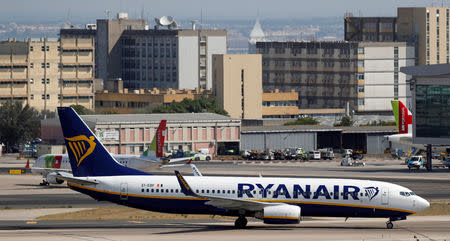 FILE PHOTO: A Ryanair Boeing 737-800 plane taxis at Lisbon's airport, Portugal September 27, 2018. REUTERS/Rafael Marchante/File Photo