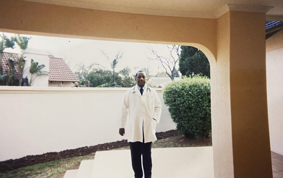 In this undated photo supplied courtesy of the Mini family, the late South African doctor and activist Dr. Clarence Mini is photographed in his doctors' uniform. Clarence Mini, a South African activist and doctor who died of COVID-19 spent his life fighting apartheid, the government's denial of HIV/AIDS and rampant corruption. Loved ones say Mini knew the odds were against him but he was committed to what he believed was right. He died in May, 2020 at age 69. (Photo courtesy of the Mini family via AP)