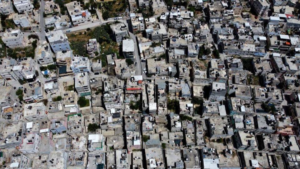 An aerial view shows al-Fawwar refugee camp southwest of Hebron in the occupied West Bank on April 8, 2021. / Credit: HAZEM BADER/AFP via Getty Images