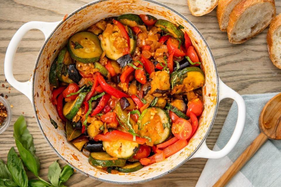 <p>This classic French countryside dish is chock full of healthy vegetables. </p><p>Get the <a href="https://www.delish.com/uk/cooking/recipes/a31072041/easy-traditional-ratatouille-recipe/" rel="nofollow noopener" target="_blank" data-ylk="slk:Ratatouille;elm:context_link;itc:0;sec:content-canvas" class="link ">Ratatouille</a> recipe.</p>