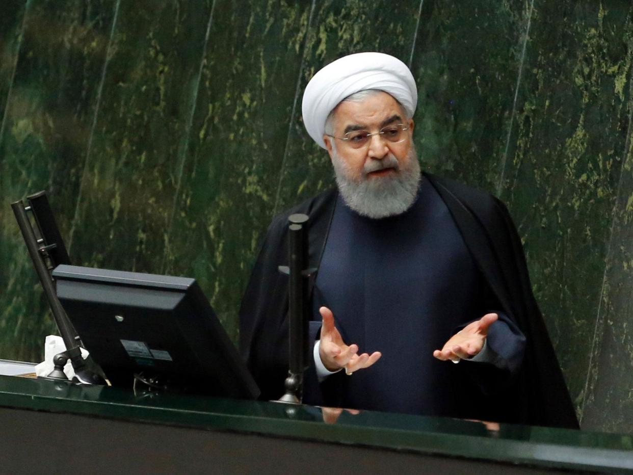 Iranian President Hassan Rouhani has highlighted his government's efforts in bringing aid and temporary housing to the victims of last month's quake, though hardline rivals say the government's response was not quick enough or adequate: EPA/ABEDIN TAHERKENAREH