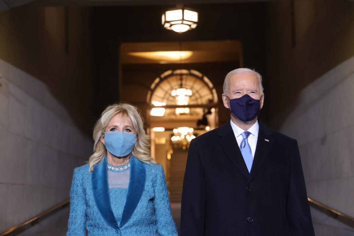 <p>President-elect Joe Biden and Jill Biden arrive at the U.S. Capitol on January 20, 2021 in Washington, DC.  </p> (Getty)