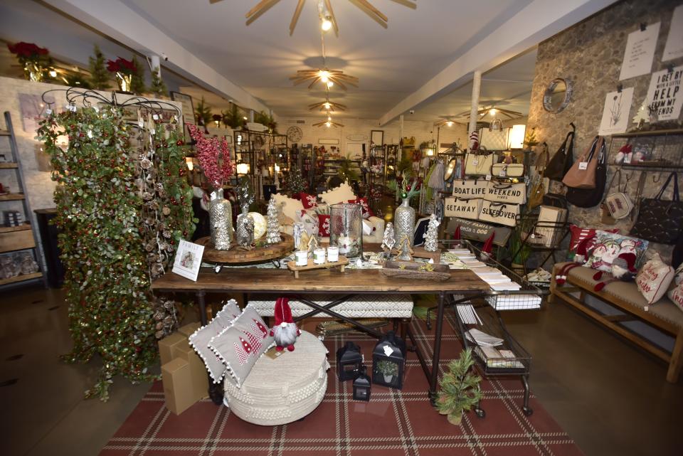 Christmas inventory at the home décor boutique the Lazy Llama located at 214 Broadway St. in Marine City on Monday, Dec. 5, 2022. The year has been dominated by headlines about rising costs of inflation and concerns about a future economic recession.