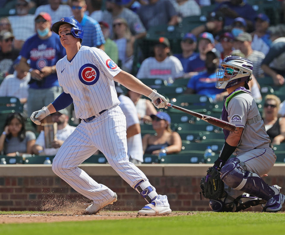 CHICAGO, ILLINOIS - AUGUST 25: Frank Schwindel #18 of the Chicago Cubs hits a triple against the Colorado Rockies at Wrigley Field on August 25, 2021 in Chicago, Illinois. The Cubs defeated the Rockies 5-2. (Photo by Jonathan Daniel/Getty Images)