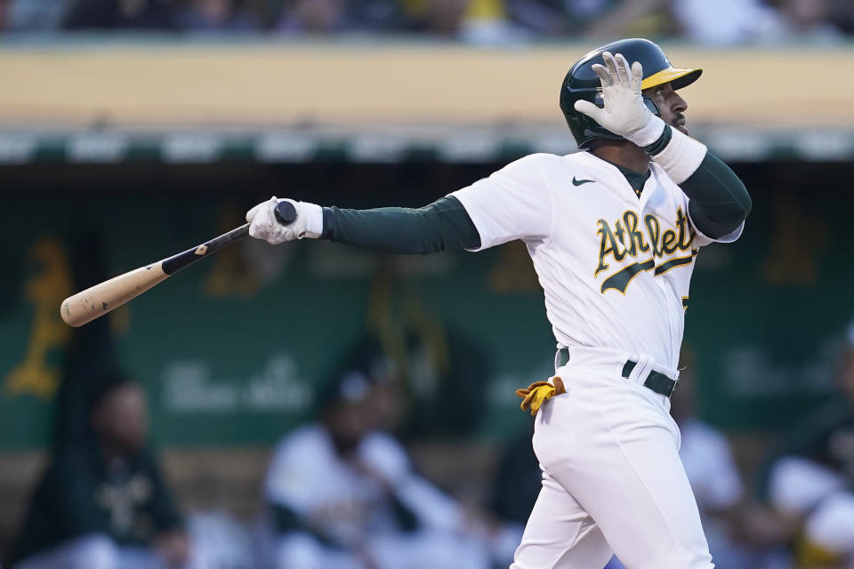 Oakland Athletics' Tony Kemp watches his two-run double against the Houston Astros during the fourth inning of a baseball game in Oakland, Calif., Monday, July 25, 2022. (AP Photo/Jeff Chiu)