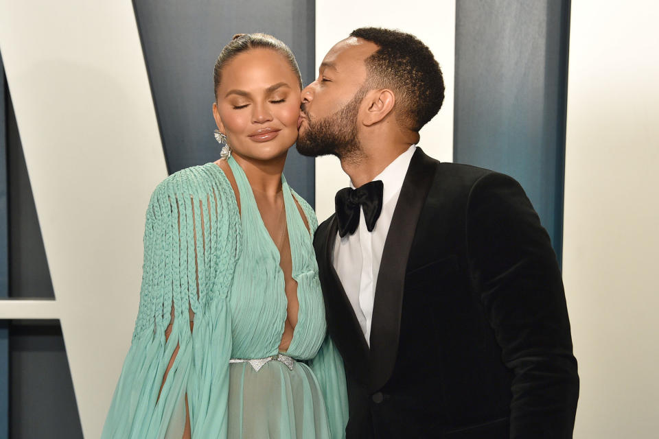 Chrissy Teigen and John Legend are pictured at the 2020 Vanity Fair Oscar Party