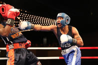 <p>Two members of New York’s Finest exchange punches in the ring during the NYPD Boxing Championships at the Theater at Madison Square Garden on June 8, 2017. (Gordon Donovan/Yahoo News) </p>