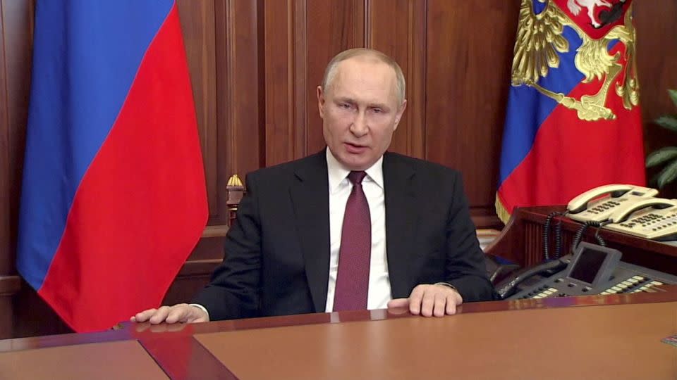 Putin delivers a video address announcing the start of the military operation. - Reuters