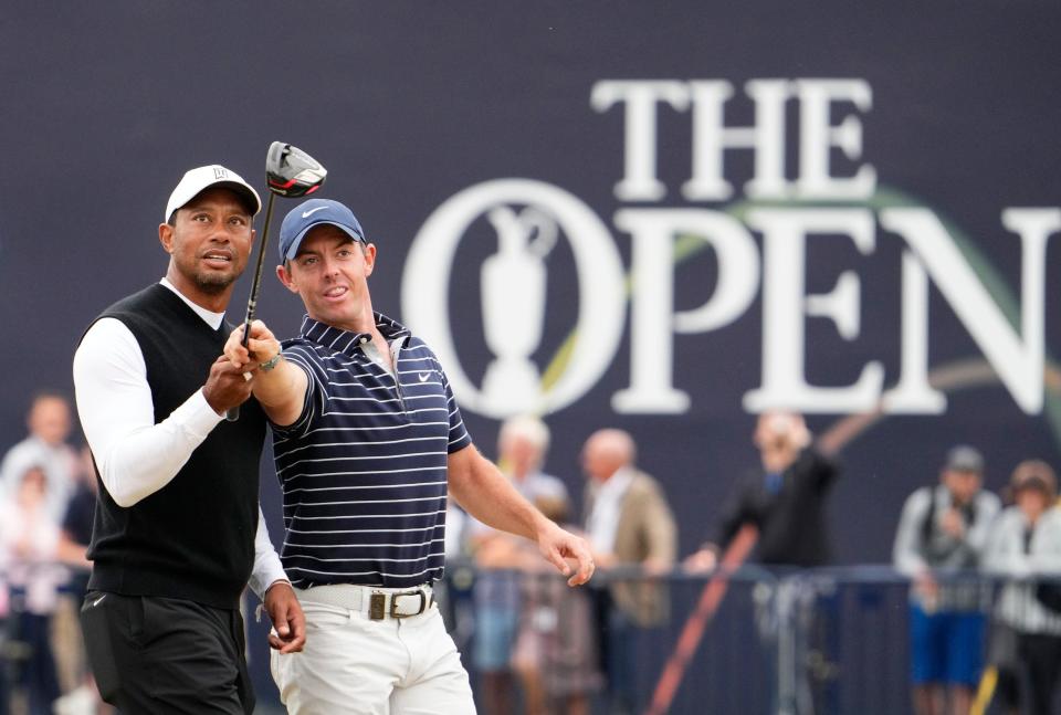 Tiger Woods, left, and Rory McIlroy during the R&A Celebration of Champions four-hole challenge before the British Open on July 11, 2022.