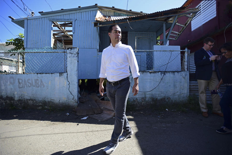 Julian Castro visits Playita, one of the poorest and most affected communities by Hurricane Maria in San Juan, Puerto Rico, Monday, Jan. 14, 2019. The presidential candidate has joined dozens of high-profile Latinos in Puerto Rico to talk about mobilizing voters ahead of the 2020 elections and increasing Latino political representation to take on President Donald Trump. (AP Photo/Carlos Giusti)