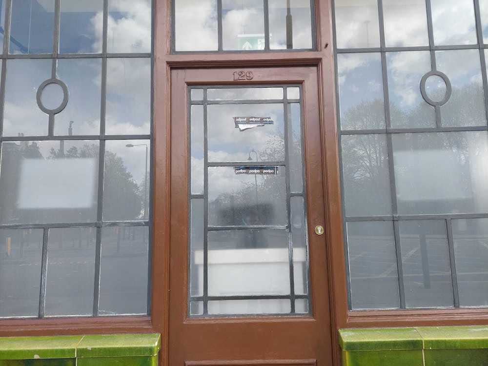 A view of the glass-paned front door of Gordon Ramsay restaurant York & Albany on April 15, 2024, as squatters occupy it.