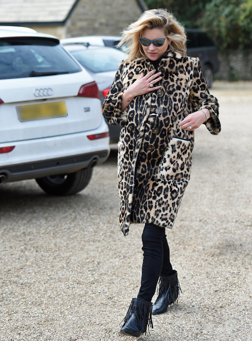 Kate Moss wears a Burberry leopard coat in London.