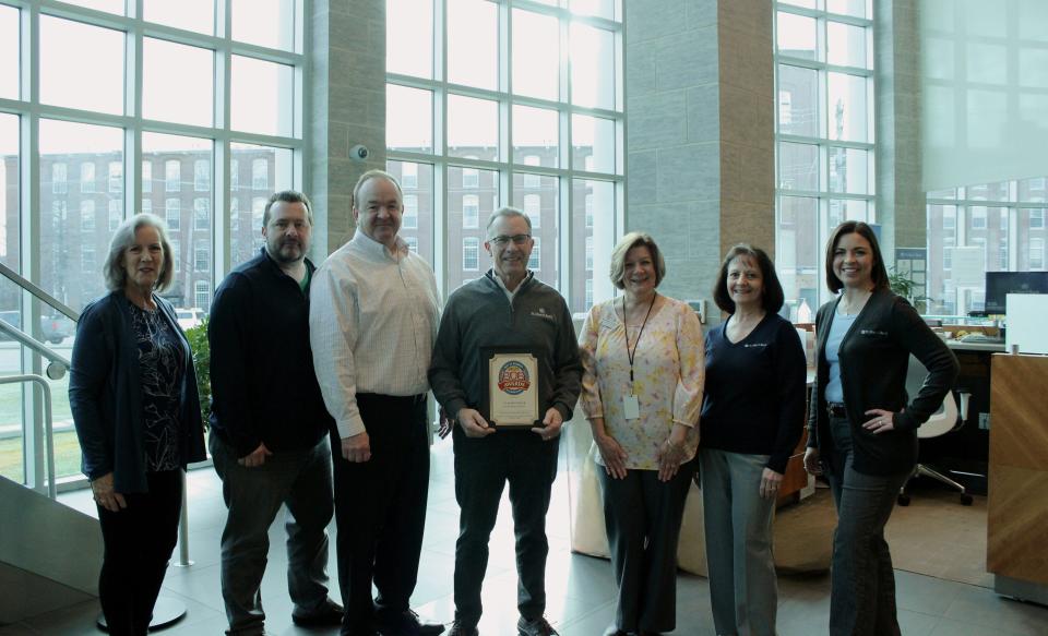 From left to right are Gloria Mazzaglia, Jason Simard, Steve Scheiner, Tom Champagne, Michelle Jordan, Anne Canty, and Kimberly Low.