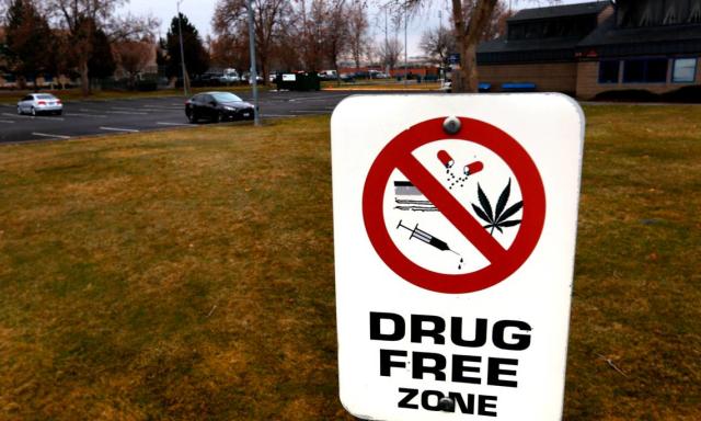 A Drug Free Zone sign is posted near the parking area at the Kenneth Serier Memorial Pool on West Sixth Avenue in downtown Kennewick. The city has passed a new law to fight public drug use.