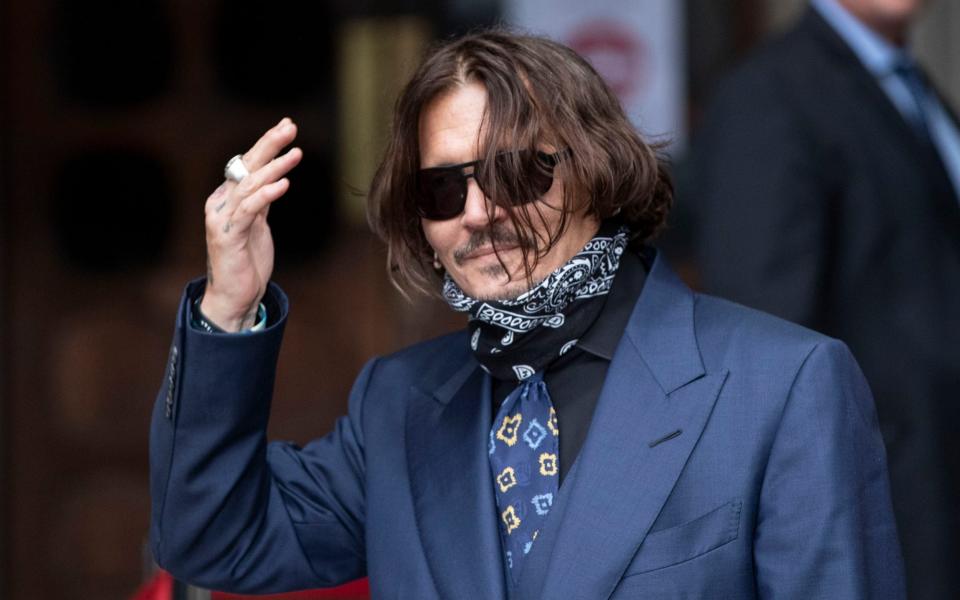 Johnny Depp arriving at the High Court in London for his libel case against the publisher of The Sun newspaper News Group Newspapers for labelling him a "wife beater"  - Heathcliff O'Malley