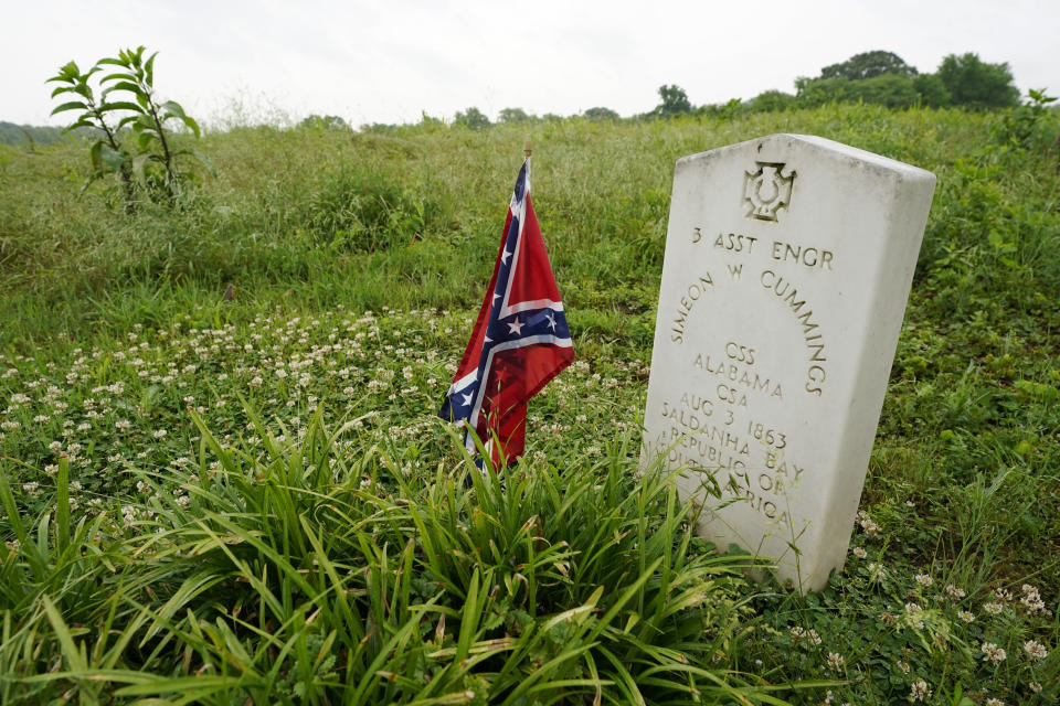 A headstone marks the grave of Simeon Cummings on the grounds of the National Confederate Museum on June 6, 2021, in Columbia, Tenn. Cummings is the currently the only Confederate soldier buried at the museum. With the approval of relatives, the remains of Confederate Gen. Nathan Bedford Forrest will be moved from Memphis, Tenn., to the museum. (AP Photo/Mark Humphrey)