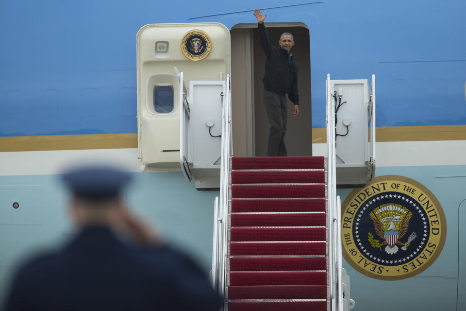 <p>President Barack Obama waves as he boards Air Force One, Saturday, May 21, 2016, at Andrews Air Force Base, Md. on his way to Vietnam. He’ll spend three days in Vietnam, with stops in Hanoi and Ho Chi Minh City, formerly Saigon, before heading to Japan for a summit of the Group of Seven industrialized nations and a historic visit to Hiroshima. (AP Photo/Evan Vucci) </p>