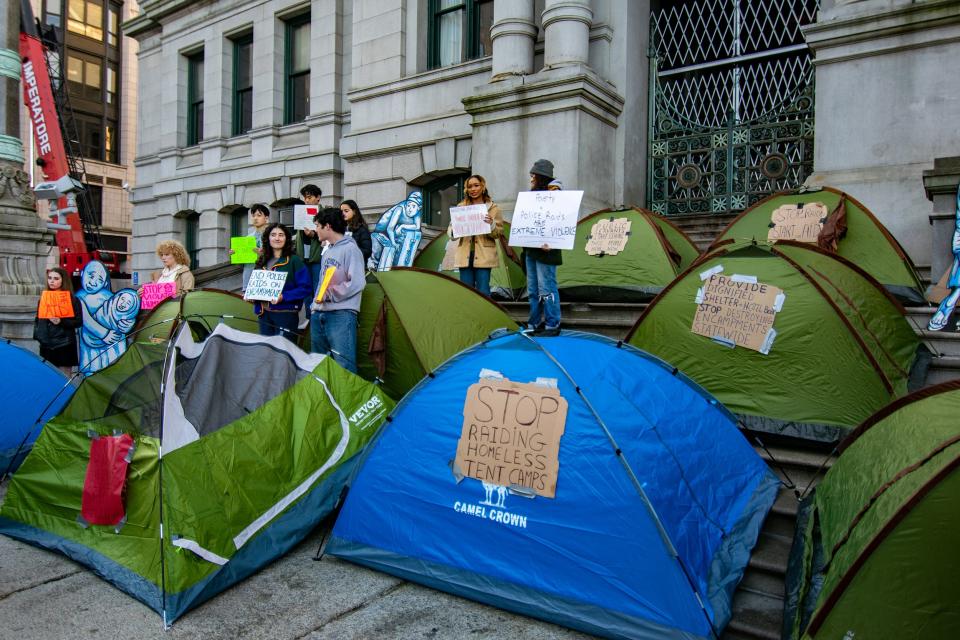 Advocates for Rhode Island's homeless population set up tents in front of Providence City Hall in October to protest the lack of shelter space.