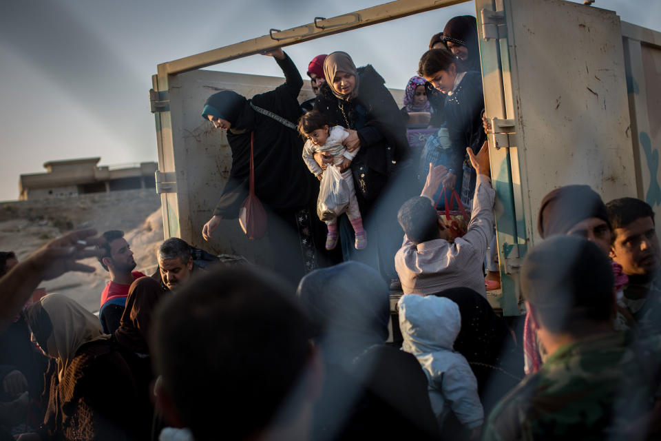 Civilians pour into a refugee camp in Gogjali, Iraq