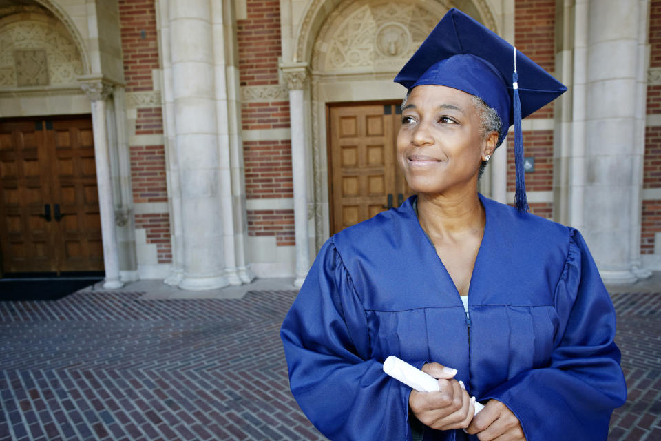 older person in their graduation gown