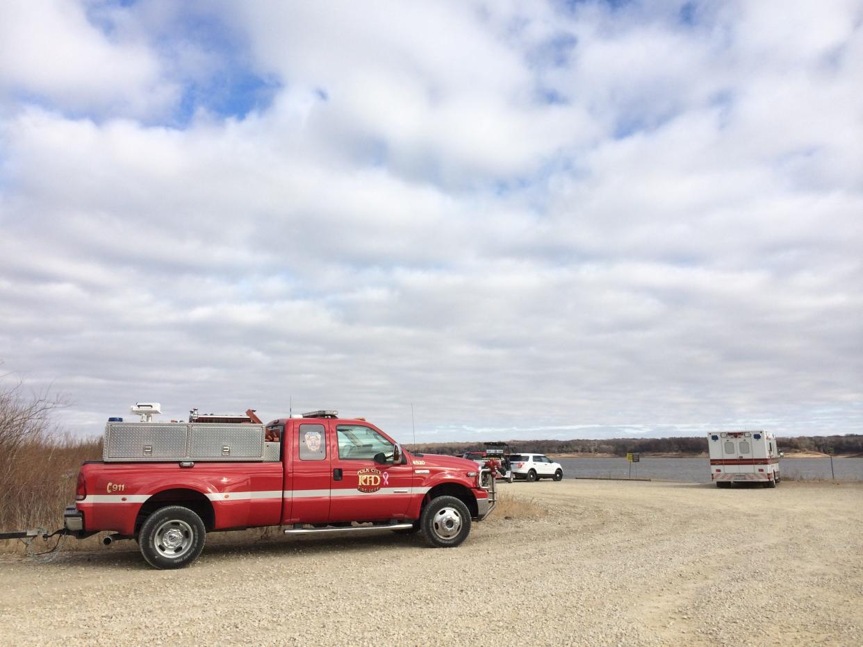 Emergency vehicles near the boat ramp on the west side of the mile-long bridge at Saylorville Lake during a 2014 search for a missing boater. The bridge was closed Monday as a search for another boater was underway.