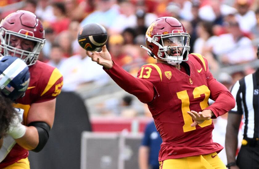 Los Angeles, California September 2, 2023-USC quarterback Caleb Williams throws a touchdown.