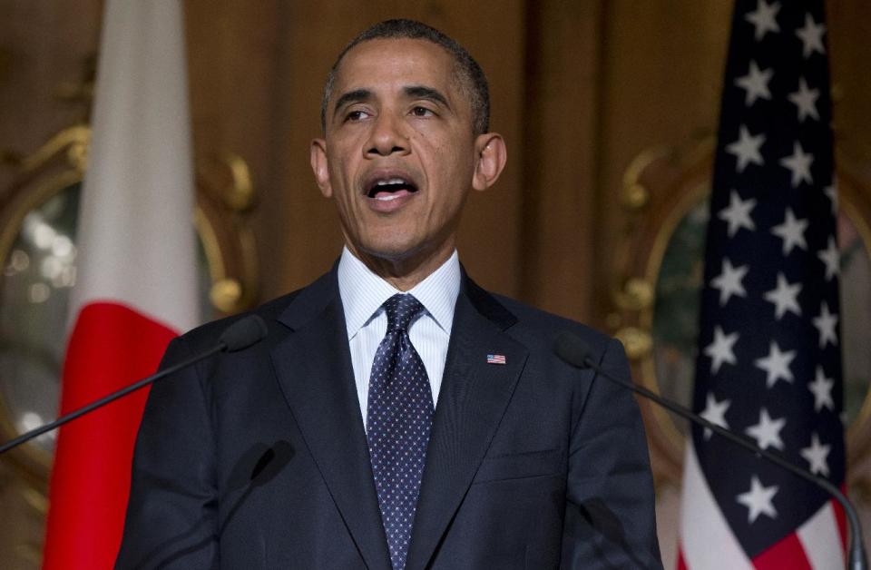 President Barack Obama speaks as he participates in a joint news conference with Japanese Prime Minister Shinzo Abe at the Akasaka Palace state guest house in Tokyo Thursday, April 24, 2014. Obama says the time is now to resolve issues preventing the conclusion of a major, 12-nation trade agreement. Opening a four-country swing through the Asia-Pacific region, Obama is aiming to promote the U.S. as a committed economic, military and political partner, but the West's dispute with Russia over Ukraine threatens to cast a shadow over the president's sales mission. (AP Photo/Carolyn Kaster)