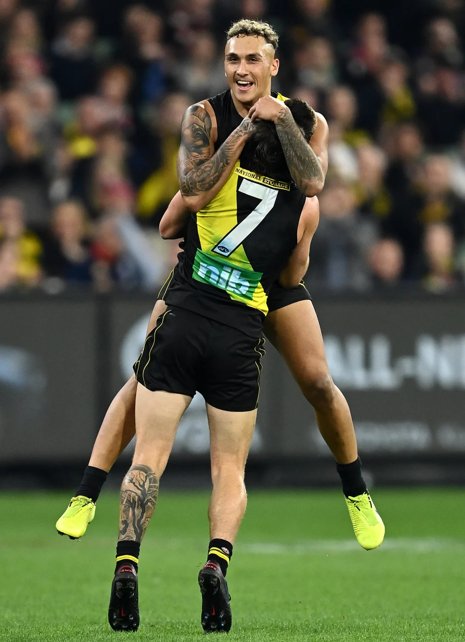 MELBOURNE, AUSTRALIA - APRIL 30: Shai Bolton of the Tigers is congratulated by Liam Baker after kicking a goal during the round seven AFL match between the Richmond Tigers and the Western Bulldogs at Melbourne Cricket Ground on April 30, 2021 in Melbourne, Australia. (Photo by Quinn Rooney/Getty Images)