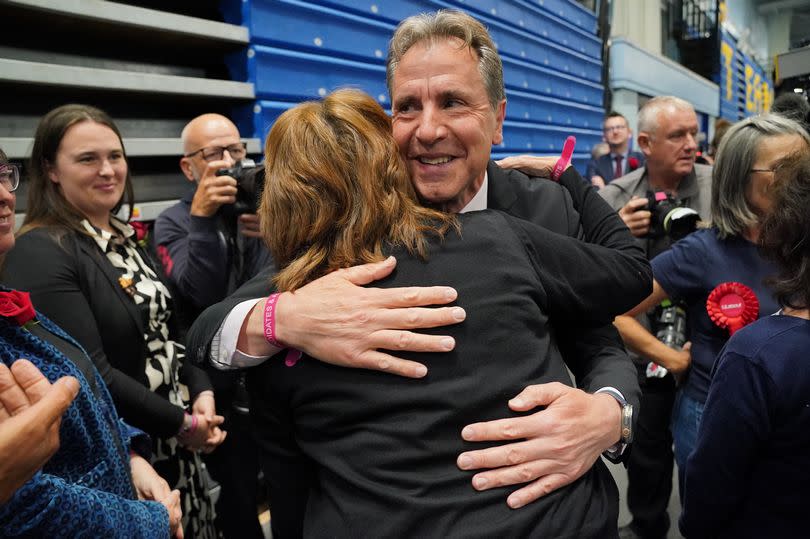 Labour's new MP Dan Norris is welcomed by supporters -Credit:Jonathan Brady/PA Wire