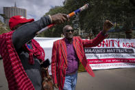 Maasai rights activists from the Maa Unity Agenda group march towards the Tanzanian high commission in downtown Nairobi, Kenya Friday, June 17, 2022. Tanzania's government is accused of violently trying to evict Maasai herders from one of the country's most popular tourist destinations, the Ngorongoro Conservation Area. (AP Photo/Ben Curtis)