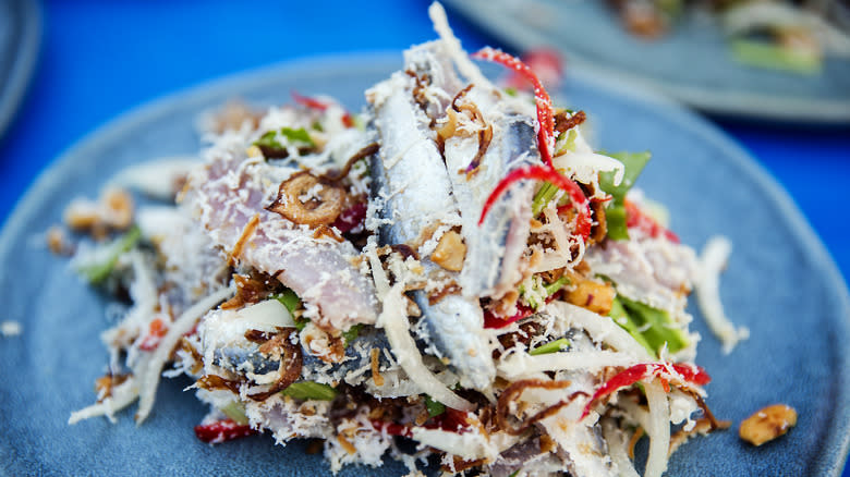 salad with fish, chilis, and herbs