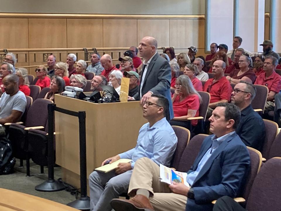 Paul Hellman, Shasta County Resource Management director, addresses the Planning Commission during a packed meeting on Wednesday, April 6, 2022, in which the panel would be hearing about the proposed Tierra Robles home development in Palo Cedro.