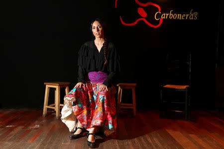 Flamenco dancer, or "bailaora", Mariana Collado, 37, poses for a portrait at Las Carboneras flamenco venue in Madrid, Spain, April 17, 2019. REUTERS/Sergio Perez