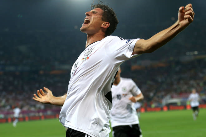 L'VIV, UKRAINE - JUNE 09: Mario Gomez of Germany scores their first goal during the UEFA EURO 2012 group B match between Germany and Portugal at Arena Lviv on June 9, 2012 in L'viv, Ukraine. (Photo by Joern Pollex/Getty Images)