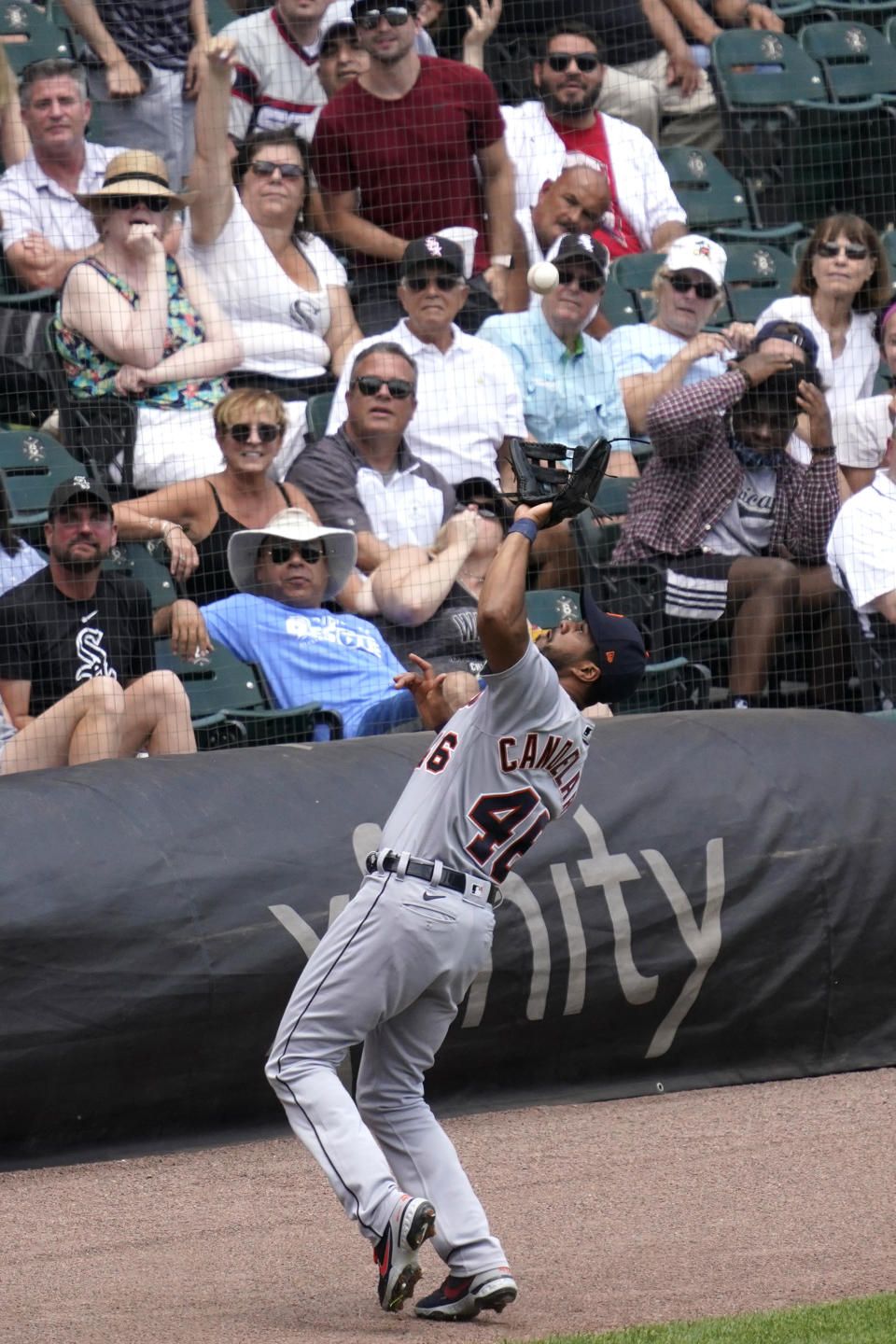 Detroit Tigers third baseman Jeimer Candelario catches a fly ball in foul territory during the first inning of a baseball game in Chicago, Sunday, June 6, 2021. (AP Photo/Nam Y. Huh)