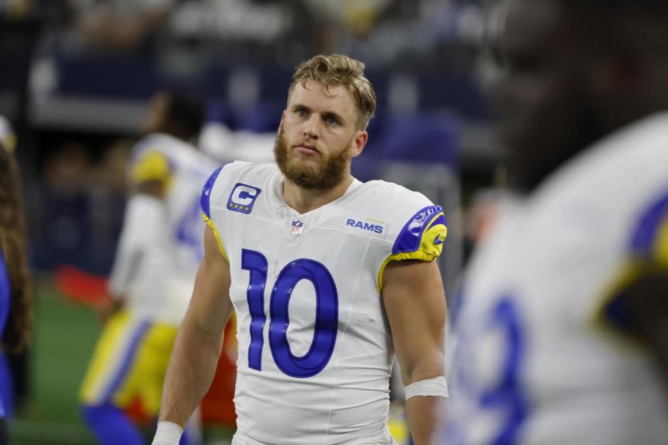 Rams wide receiver Cooper Kupp (10) walks on the sideline.