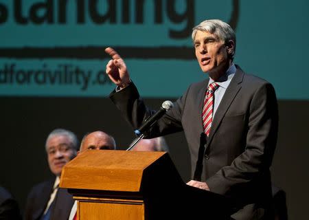 U.S. Senator Mark Udall speaks during a memorial service marking the anniversary of the Tuscon shooting, at the University of Arizona campus in this file photo from January 8, 2012. REUTERS/Laura Segall/Files