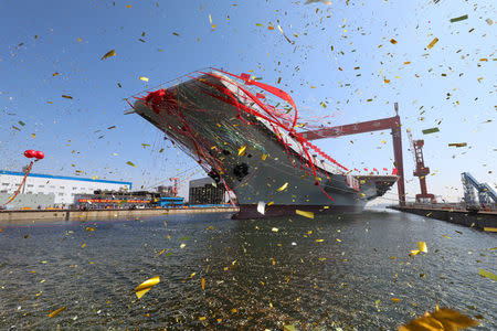 China's second aircraft carrier, first domestically built aircraft carrier, is seen during its launching ceremony in Dalian, Liaoning province, China, April 26, 2017. REUTERS/Li Gang/Xinhua