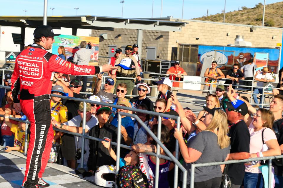 Mitchell's Chase Briscoe greets fans after his NASCAR Cup Series win at Phoenix Raceway.