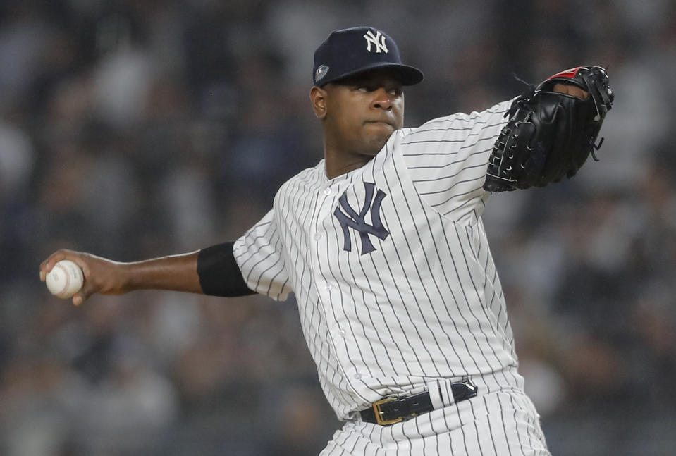 FILE - In this Oct. 8, 2018, file photo, New York Yankees starting pitcher Luis Severino delivers against the Boston Red Sox during the first inning of Game 3 of baseball's American League Division Series in New York. Severino makes his season debut for the Yankees when New York opens its final homestand of the regular season against the Los Angeles Angels. (AP Photo/Julie Jacobson, File)