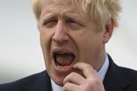 Britain's Prime Minister Boris Johnson visits the NLV Pharos, a lighthouse tender moored on the river Thames, to mark London International Shipping Week in London, Thursday, Sept. 12, 2019. The British government insisted Thursday that its forecast of food and medicine shortages, gridlock at ports and riots in the streets after a no-deal Brexit is an avoidable worst-case scenario, as Prime Minister Boris Johnson denied misleading Queen Elizabeth II about his reasons for suspending Parliament just weeks before the country is due to leave the European Union. (Daniel Leal-Olivas/Pool photo via AP)