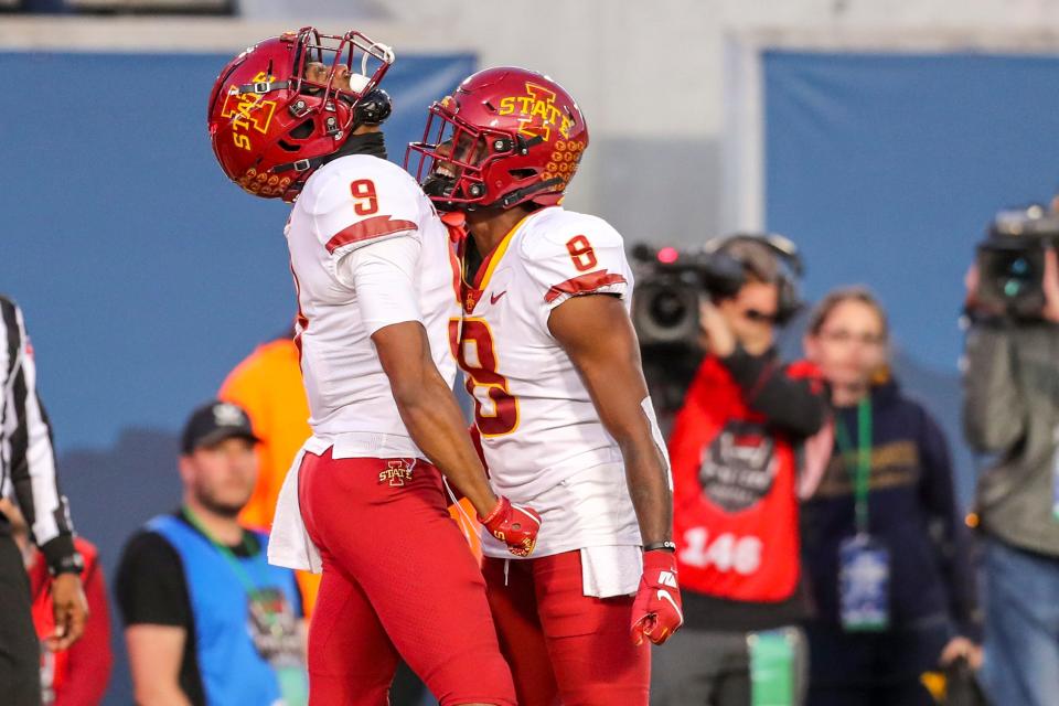 Oct 12, 2019; Morgantown, WV, USA; Iowa State Cyclones wide receiver Joseph Scates (9) celebrates after catching touchdown pass with wide receiver Deshaunte Jones (8) during the fourth quarter against the West Virginia Mountaineers at Mountaineer Field at Milan Puskar Stadium. Mandatory Credit: Ben Queen-USA TODAY Sports